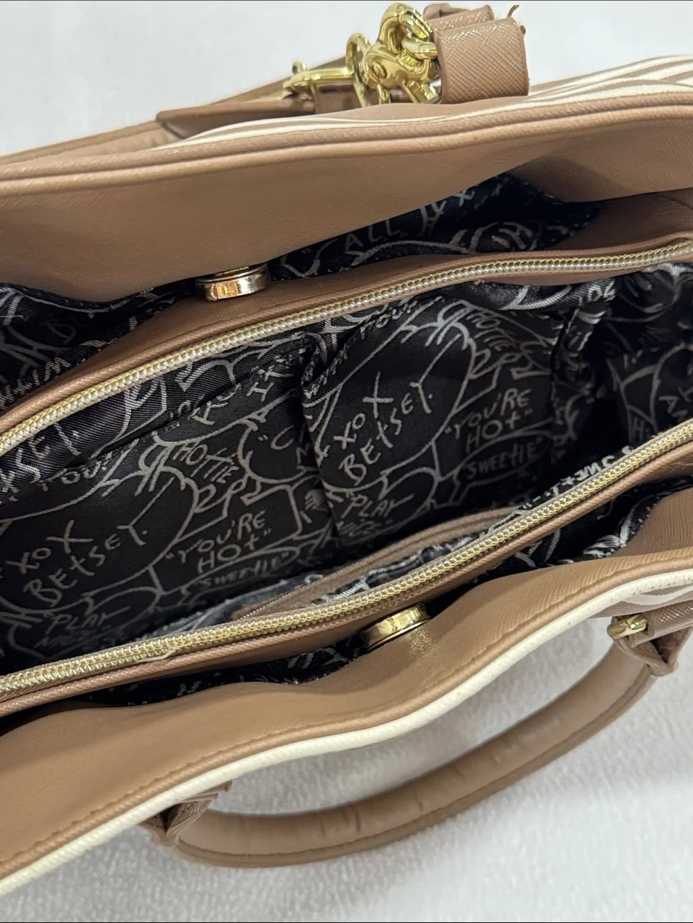 Betsey Johnson Brown and Cream Striped Satchel with Bow Charm